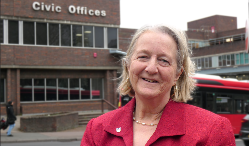 Leader of the Council, Councillor Ruth Dombey standing outside the Civic Offices, Sutton