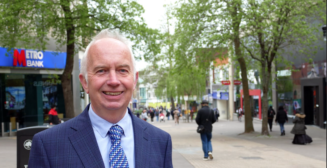 New Leader of the Council, Councillor Barry Lewis standing on Sutton High Street 