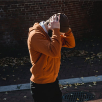 image of man covering his ears