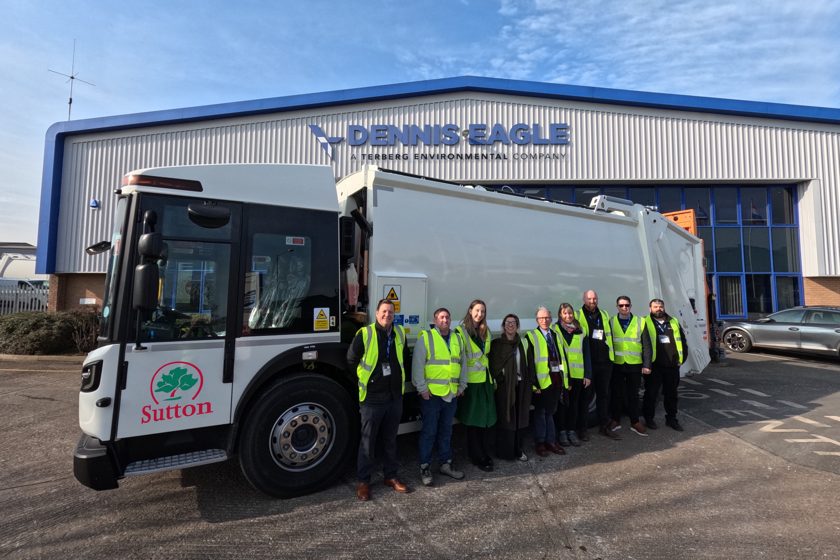 Councillors and staff with a waste collection vehicle outside the Dennis factory