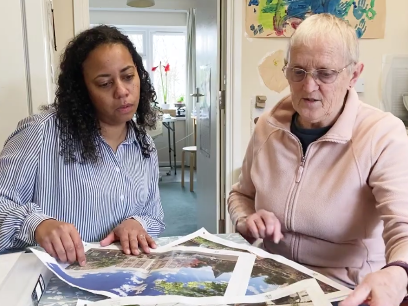 Sabrina and Linda looking at paperwork