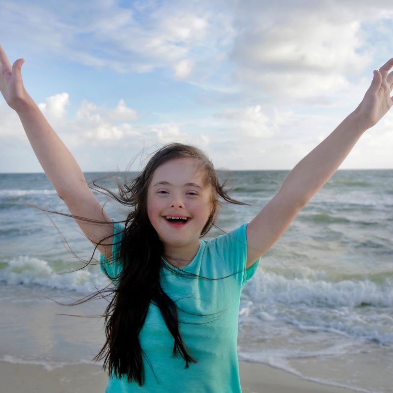 Girl at the beach, by the sea