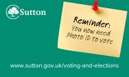 Image in green says Reminder, you now need photo ID to vote