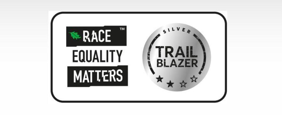 Box with silver circle and text reading Silver trail blazer, Race Equality Matters