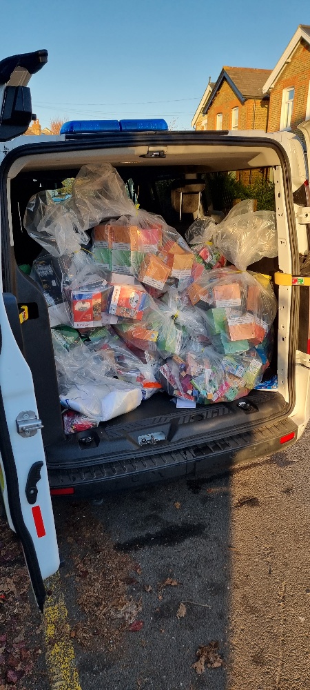 Dangerous counterfeit goods seized taking up the whole boot space of a van.