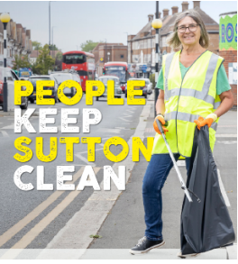 woman using a litter picker